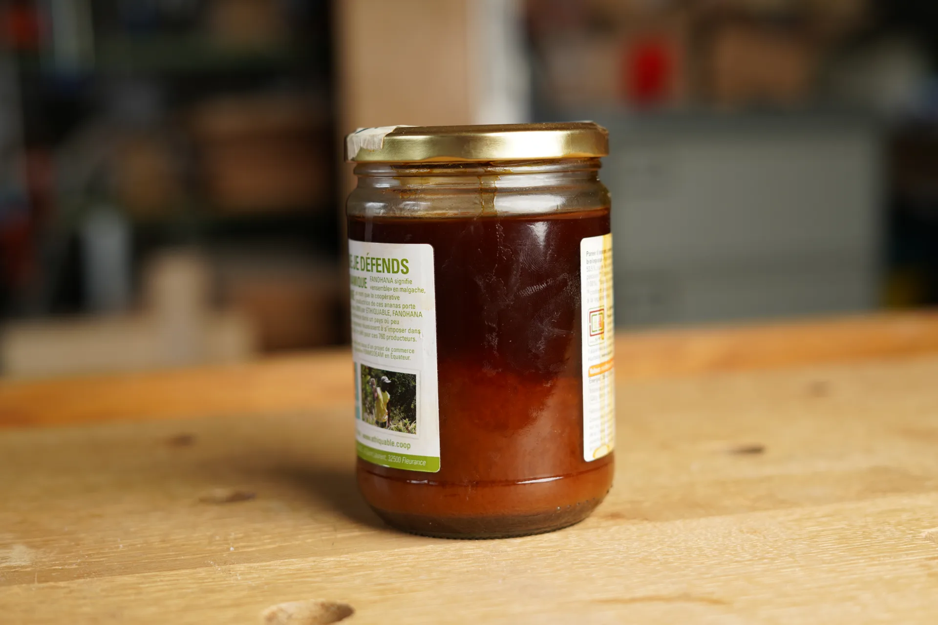 Drawing off the clear dewaxed varnish with a syringe after settling, then filtering through a coffee filter