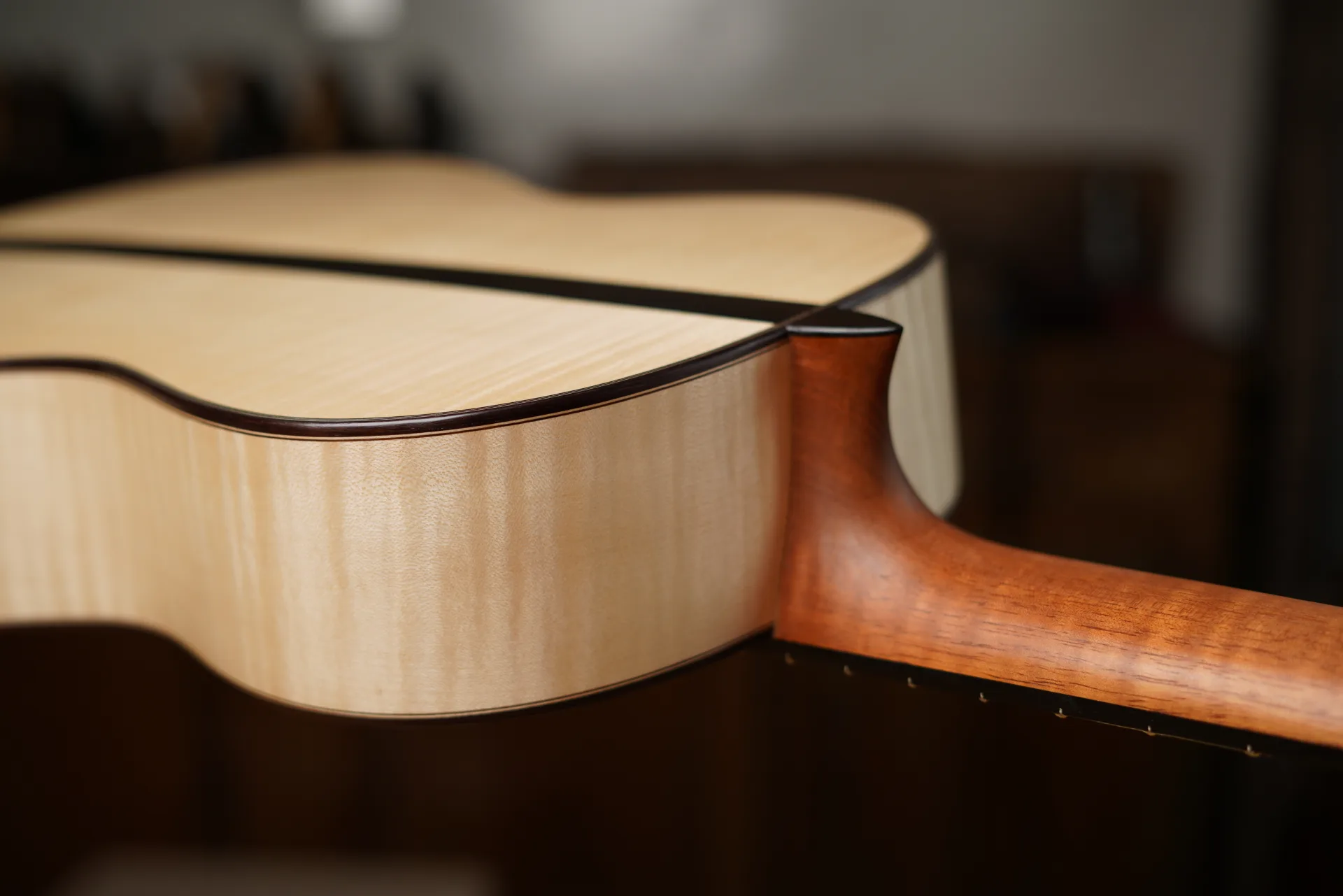 A small fold of cloth shaped with the fingertip to reach tight corners with a carefully dosed amount of varnish