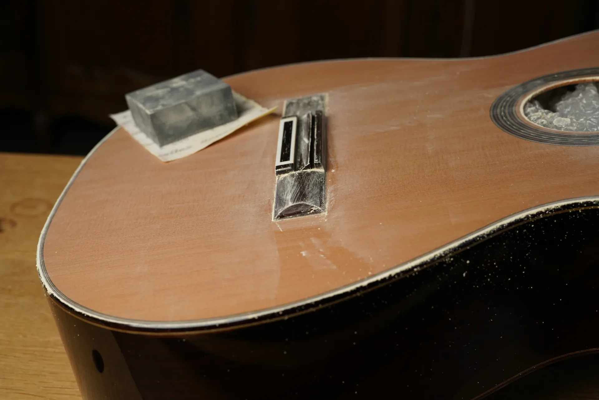 Sanding always carried out in the direction of the wood grain — very light hand pressure