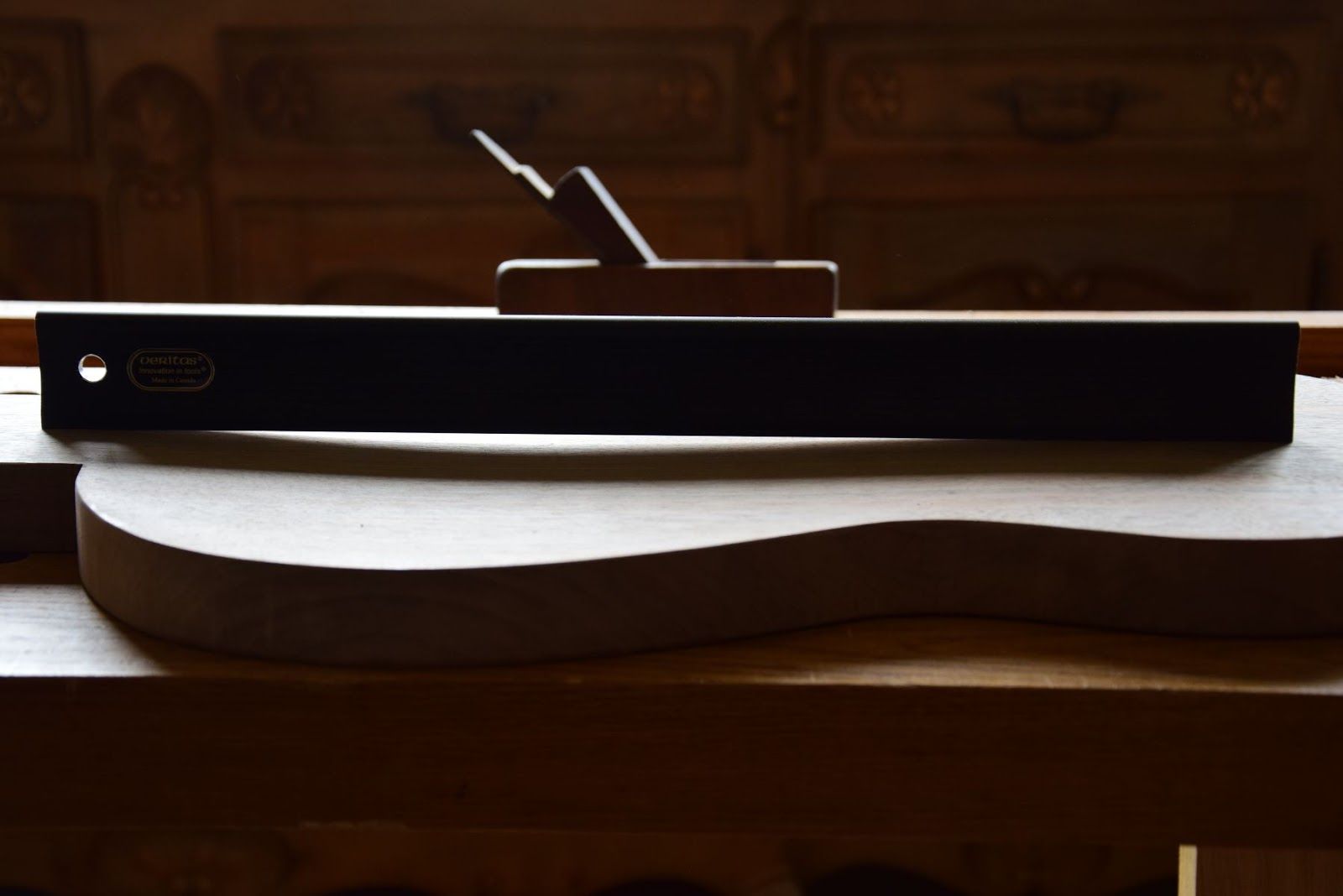 Hide glue pot — brush dripping with warm glue