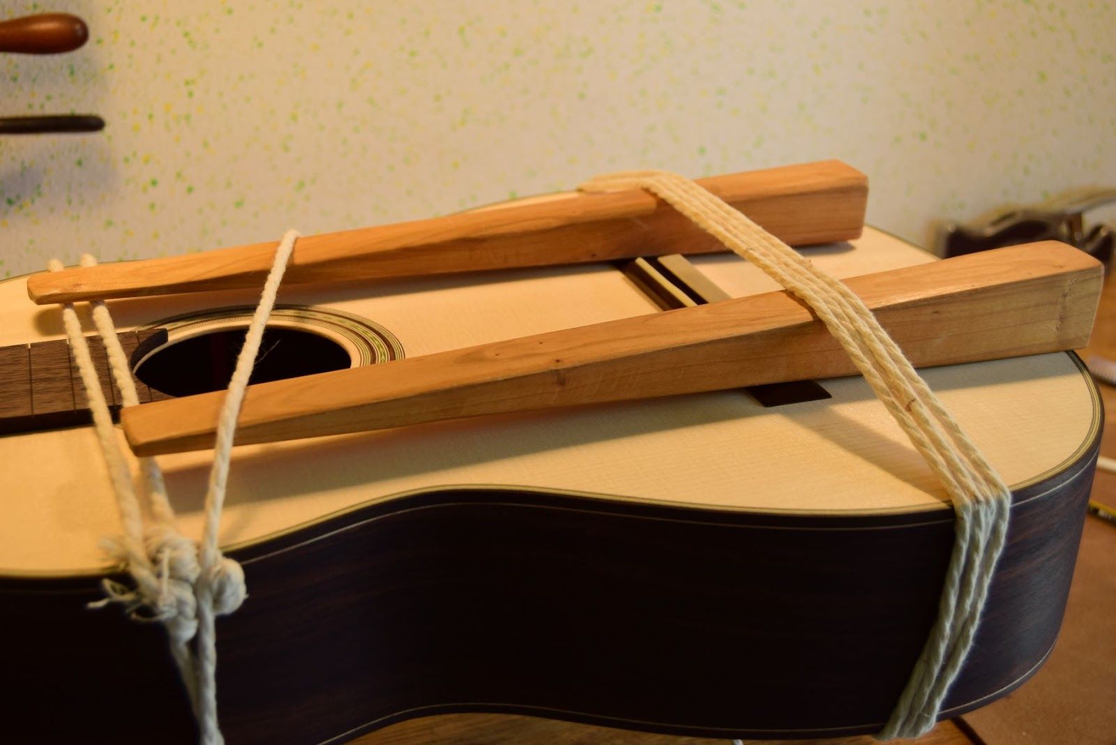 Body wrapped tightly with cotton string — 100 metres of cord serving as distributed clamping