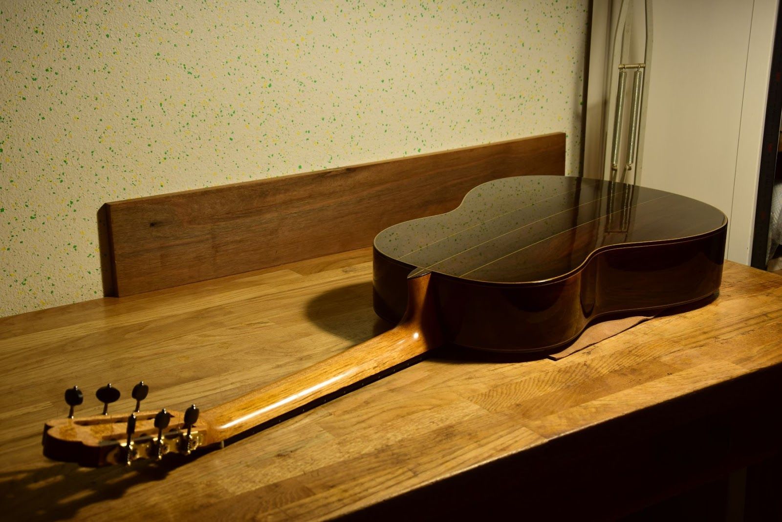 The finished Torres model guitar — lying on the workbench