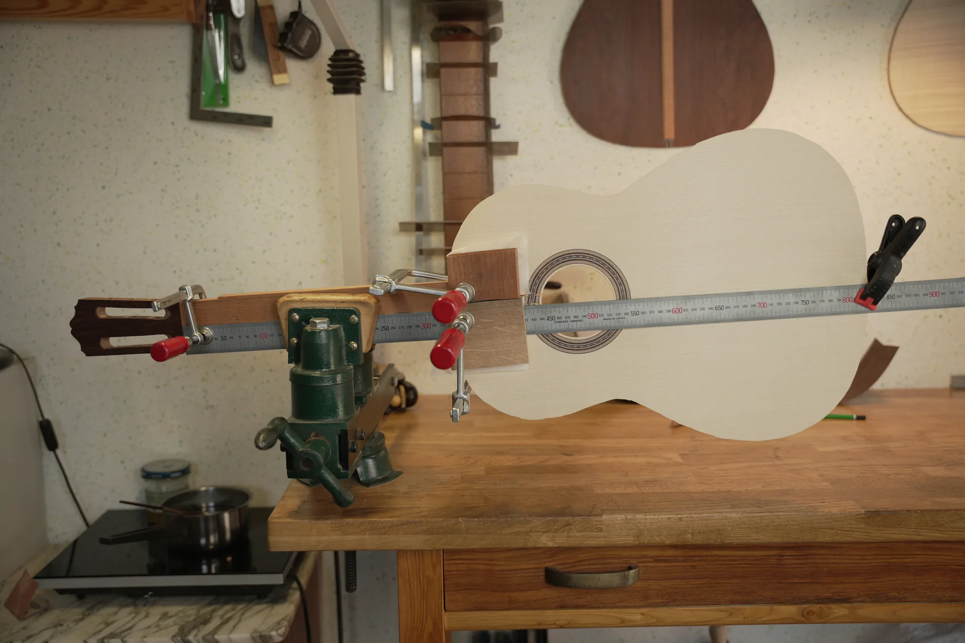 Gluing the neck to the soundboard with a straightedge