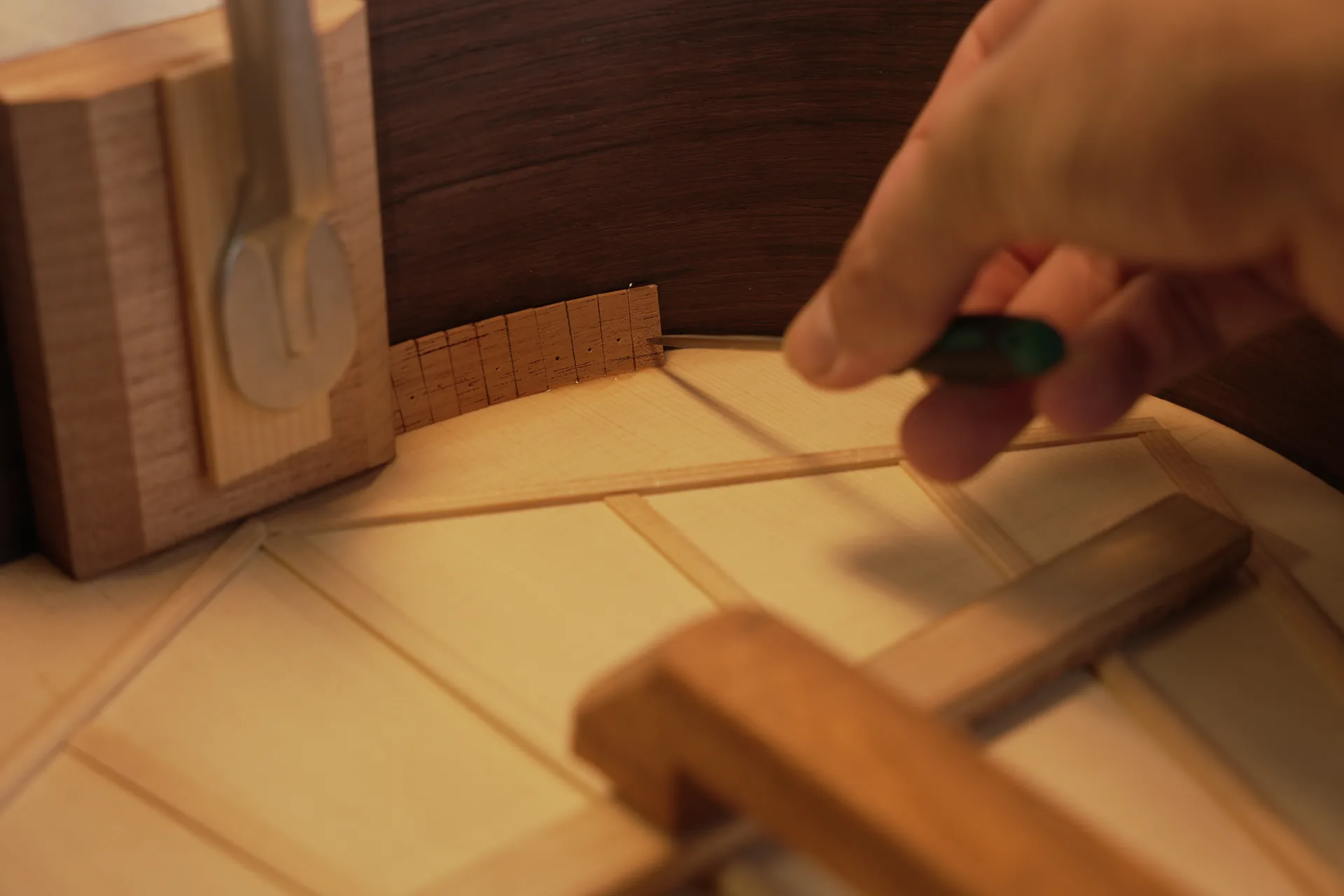 Lining blocks pressed into place with the pointed tool