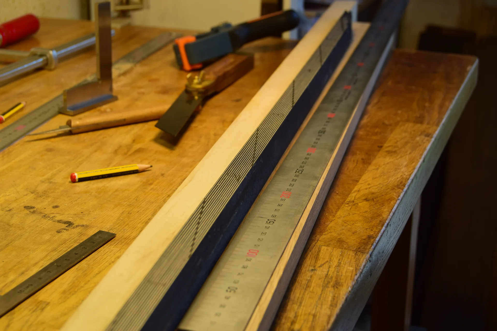 The glued stick ready to be cut at the marked angle