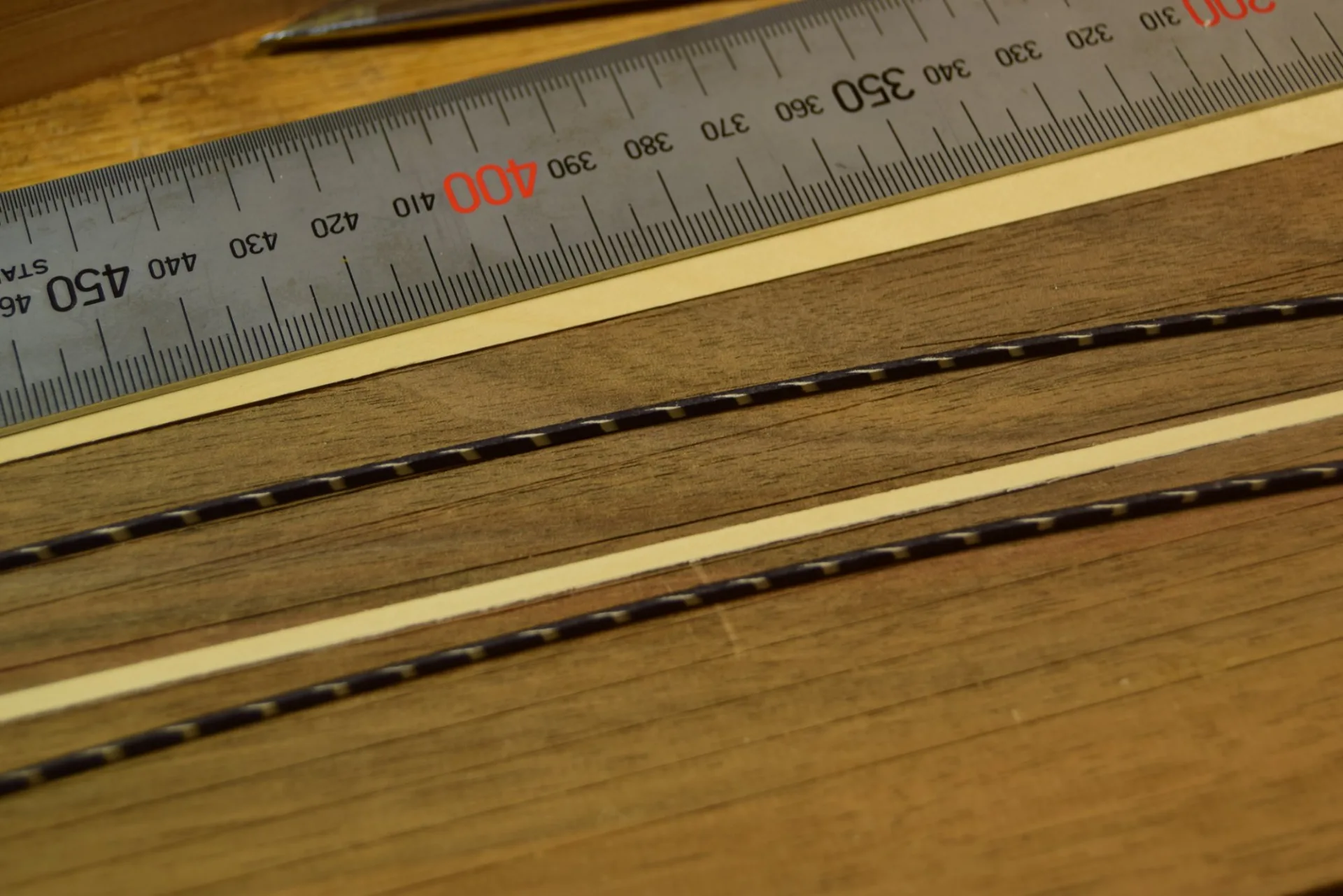 The central veneer strip prepared to two-tenths of a millimetre thickness